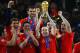 JOHANNESBURG, SOUTH AFRICA - JULY 11: Goalscorer Andres Iniesta of Spain lifts the World Cup trophy as the Spain team celebrate victory following the 2010 FIFA World Cup South Africa Final match between Netherlands and Spain at Soccer City Stadium on July 11, 2010 in Johannesburg, South Africa. (Photo by Laurence Griffiths/Getty Images)