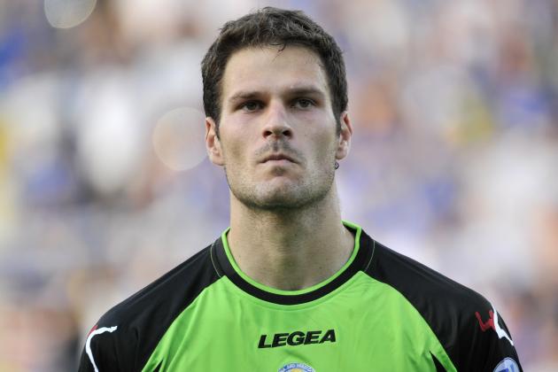 Bosnia's Asmir Begovic  stands during the playing of the national anthems before the start of  World Cup 2014 Group G qualification match between Latvia and Bosnia in Riga, Latvia, on Friday, June 7, 2013.( AP Photo/Roman Koksarov)