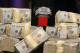 The championship bracelet is displayed on a pile of money before the start of the World Series of Poker final table, Tuesday, Nov. 5, 2013, in Las Vegas. Two finalists remain in the game playing for an $8.4 million crown. (AP Photo/Julie Jacobson)