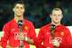 YOKOHAMA, JAPAN - DECEMBER 21: Wayne Rooney and Cristiano Ronaldo of Manchester United receives Golden Ball and Silver Ball respectively during the award ceremony after the FIFA Club World Cup Japan 2008 final match between Manchester United and Liga de Quito at the International Stadium Yokohama on December 21, 2008 in Yokohama, Kanagawa, Japan. Manchester United won by 1-0. (Photo by Koichi Kamoshida/Getty Images)