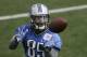 Detroit Lions NFL football tight end Eric Ebron makes a catch during organized team activities at the Lions training camp facility in Allen Park, Mich., Wednesday, May 21, 2014. (AP Photo/Carlos Osorio)