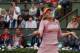 Russia's Maria Sharapova returns the ball to compatriot Ksenia Pervak during their first round match of the French Open tennis tournament at the Roland Garros stadium, in Paris, France, Monday, May 26, 2014. Sharapova won 6-1, 6-2. (AP Photo/Michel Euler)