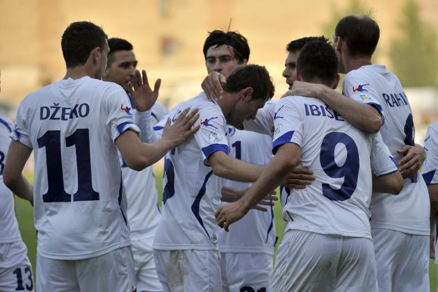 Bosnia's team players celebrates after scoring a goal against Latvia during their World Cup 2014 Group G qualification match in Riga, Latvia, on Friday, June 7, 2013.( AP Photo/Roman Koksarov)