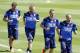 From left, Andrea Barzagli, Daniele De Rossi, Leonardo Bonucci and Giorgio Chiellini warm up during a training session in Coverciano training complex, in Florence, Italy, Tuesday, May 20 , 2014, Italy opened its World Cup training camp Monday with 31 players. Coach Cesare Prandelli needs to trim his squad to 23 players by June 2. In Brazil, Italy is in Group D with England, Uruguay and Costa Rica. (AP Photo/Fabrizio Giovannozzi)