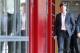 Coach of German national soccer team Joachim Loew is on his way to a press conference where he will present his preliminary team for the upcoming World Cup in Brazil in Frankfurt, Germany, Thursday, May 8, 2014. (AP Photo/Michael Probst)
