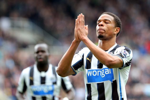 Newcastle United's Loic Remy celebrates his goal during their English Premier League soccer match against Cardiff City at St James' Park, Newcastle, England, Saturday, May 3, 2014. (AP Photo/Scott Heppell)