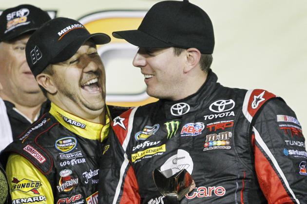 NASCAR truck driver Kyle Busch, right, is congratulated by driver Matt Crafton, left, after winning the Camping World Truck Series race at Kansas Speedway in Kansas City, Kan., Friday, May 9, 2014. Crafton placed second in the race. (AP Photo/Colin E. Braley)