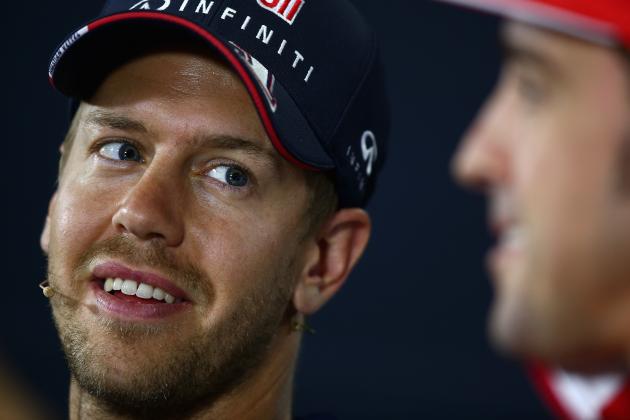 MONTMELO, SPAIN - MAY 08: Sebastian Vettel (L) of Germany and Infiniti Red Bull Racing looks on next to Fernando Alonso of Spain and Ferrar during a press conference ahead of the Spanish F1 Grand Prix at Circuit de Catalunya on May 8, 2014 in Montmelo, Spain. (Photo by Clive Mason/Getty Images)