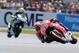 Spanish MotoGP rider Marc Marquez of the Repsol Honda Team leads the race ahead of Italian MotoGP rider Valentino Rossi of Movistar Yamaha Team, left, during the MotoGP World Championship race at the Bugatti race track in Le Mans, western France, Sunday, May 18, 2014. (AP Photo/David Vincent)