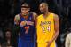 LOS ANGELES, CA - DECEMBER 29: Carmelo Anthony #7 of the New York Knicks and Kobe Bryant #24 of the Los Angeles Lakers look on during their game at Staples Center on December 29, 2011 in Los Angeles, California. NOTE TO USER: User expressly acknowledges and agrees that, by downloading and/or using this Photograph, user is consenting to the terms and conditions of the Getty Images License Agreement. Mandatory Copyright Notice: Copyright 2011 NBAE (Photo by Juan Ocampo/NBAE via Getty Images)