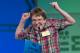 Eighth grade home-schooled student Jacob Williamson, 15, of Cape Coral, Fla., reacts after correctly spelling his word