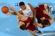 Jan 18, 2014; Chapel Hill, NC, USA; North Carolina Tar Heels forward Isaiah Hicks (22) shoots as Boston College Eagles forward Will Magarity (11) and guard Joe Rahon (25) defend in the first half. The Tar Heels defeated the Eagles 82-71 at Dean E. Smith Student Activities Center. Mandatory Credit: Bob Donnan-USA TODAY Sports