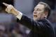 Michigan State head coach Tom Izzo directs his team in the second half of an NCAA college basketball game against Northwestern in the quarterfinals of the Big Ten Conference tournament Friday, March 14, 2014, in Indianapolis. (AP Photo/Michael Conroy)