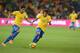 JOHANNESBURG, SOUTH AFRICA - MARCH 05: Paulinho and Neymar of Brazil in action during the International Friendly match between South Africa and Brazil at FNB Stadium on March 05, 2014 in Johannesburg, South Africa. (Photo by Lefty Shivambu/Gallo Images/Getty Images)