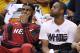 May 28, 2014; Indianapolis, IN, USA; Miami Heat forward LeBron James (left) and Miami Heat guard Dwyane Wade (right) sit on the bench during the fourth quarter in game five against the Indiana Pacers of the Eastern Conference Finals of the 2014 NBA Playoffs at Bankers Life Fieldhouse. Indiana defeats Miami 93-90. Mandatory Credit: Brian Spurlock-USA TODAY Sports