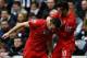 NEWCASTLE UPON TYNE, ENGLAND - FEBRUARY 24: Rickie Lambert of Southampton celebrates his goal with Adam Lallana during the Barclays Premier League match between Newcastle United and Southampton at St James' Park on February 24, 2013 in Newcastle upon Tyne, England. (Photo by Matthew Lewis/Getty Images)