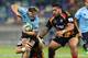 NEW PLYMOUTH, NEW ZEALAND - MAY 31: Michael Hooper of the Waratahs is tackled while Ben Tameifuna of the Chiefs looks on during the round 16 Super Rugby match between the Chiefs and the Waratahs at Yarrow Stadium on May 31, 2014 in New Plymouth, New Zealand. (Photo by Hagen Hopkins/Getty Images)