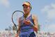 Serbia's Ana Ivanovic misses a return during the third round match of the French Open tennis tournament against Lucie Safarova of the Czech Republic at the Roland Garros stadium, in Paris, France, Saturday, May 31, 2014. Safarova won in two sets 6-3, 6-3. (AP Photo/David Vincent)