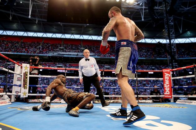 LONDON, ENGLAND - MAY 31:  Kevin Mitchell in action with Ghislain Maduma during their IBF World Lightweight Final Eliminator bout at Wembley Stadium on May 31, 2014 in London, England.  (Photo by Scott Heavey/Getty Images)