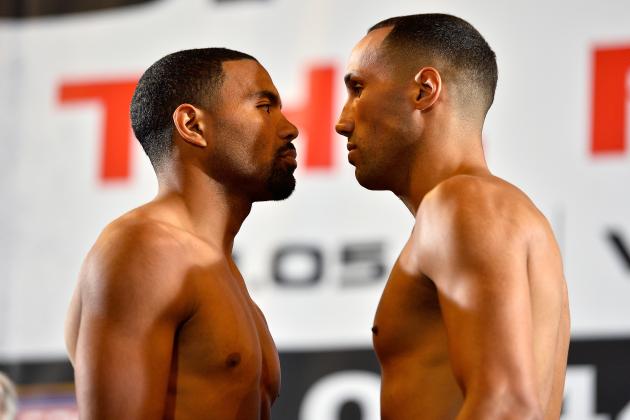 LONDON, ENGLAND - MAY 30:  James DeGale (R) and Brandon Gonzales square up at the Carl Froch v George Groves - Weigh-In at Wembley Arena on May 30, 2014 in London, England. The WBA & IBF Super Middleweight World Championship fight between Carl Froch and George Groves takes place at Wembley Stadium on Saturday May 31st.  (Photo by Justin Setterfield/Getty Images)