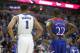 Duke forward Jabari Parker (1) and Kansas guard Andrew Wiggins (22) wait for a free throw during the second half of an NCAA college basketball game Tuesday, Nov. 12, 2013, in Chicago. Kansas won 94-83. (AP Photo/Charles Rex Arbogast)