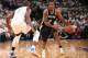 OKLAHOMA CITY, OK MAY 31: Kawhi Leonard #2 of the San Antonio Spurs handles the ball against the Oklahoma City Thunder in Game Six of the Western Conference Finals during the 2014 NBA Playoffs on May 31, 2014 at the Chesapeake Energy Arena in Oklahoma City, Oklahoma. NOTE TO USER: User expressly acknowledges and agrees that, by downloading and or using this photograph, User is consenting to the terms and conditions of the Getty Images License Agreement. Mandatory Copyright Notice: Copyright 2014 NBAE (Photo by Layne Murdoch Jr./NBAE via Getty Images)