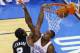 May 31, 2014; Oklahoma City, OK, USA; San Antonio Spurs forward Kawhi Leonard (2) goes up for a dunk in front of Oklahoma City Thunder forward Serge Ibaka (9) in the first quarter in game six of the Western Conference Finals of the 2014 NBA Playoffs at Chesapeake Energy Arena. Mandatory Credit: Alonzo Adams-USA TODAY Sports