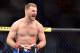 May 31, 2014; Sao Paulo, SP, BRAZIL; Stipe Miocic (red gloves) reacts after his fight against Fabio Maldonado (blue gloves) during the TUF Brazil 3 Finale at Ibirapuera Gymnasium. Mandatory Credit: Jason Silva-USA TODAY Sports