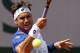 Spain's David Ferrer returns the ball to Italy's Andreas Seppi during the third round match of the French Open tennis tournament at the Roland Garros stadium, in Paris, France, Saturday, May 31, 2014. (AP Photo/Darko Vojinovic)