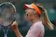 Russia's Maria Sharapova celebrates scoring a point during the fourth round match of the French Open tennis tournament against Australia's Samantha Stosur at the Roland Garros stadium, in Paris, France, Sunday, June 1, 2014. Sharapova won in three sets 3-6, 6-4, 6-0. (AP Photo/Darko Vojinovic)