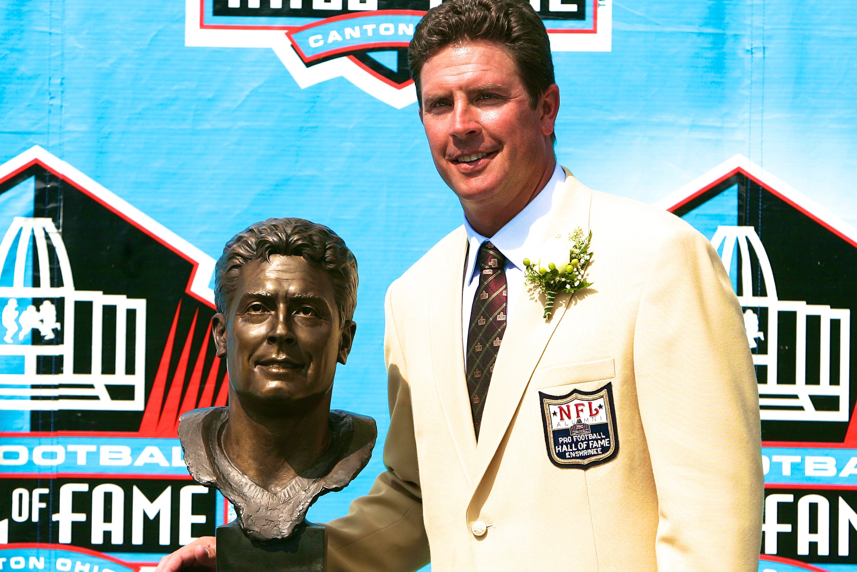 Hall of Fame quarterback Dan Marino joins other players in