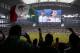 Mexico fans wave a national flag during the playing of their country's national anthem before a friendly soccer match against Ecuador, Saturday, May 31, 2014, in Arlington, Texas. (AP Photo/Tony Gutierrez)