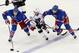 Nov 17, 2013; New York, NY, USA; New York Rangers defenseman John Moore (17) and center Derick Brassard (16) keep Los Angeles Kings center Mike Richards (10) off the puck during the third period at Madison Square Garden. Mandatory Credit: Anthony Gruppuso-USA TODAY Sports