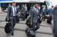 LUTON, ENGLAND - JUNE 01: In this handout image supplied by the FA, Alex Oxlade-Chamberlain (L) and Raheem Sterling of England with the rest of the squad prepare to board a plane leaving for the 2014 Brazil World Cup on June 1, 2014 in Luton, England. (Photo by The FA/The FA via Getty Images)
