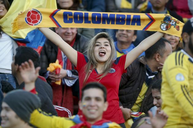A Colombian fan cheers for her team before an international friendly soccer match against Senegal in Buenos Aires, Argentina, Saturday, May 31, 2014. (AP Photo/Victor R. Caivano)