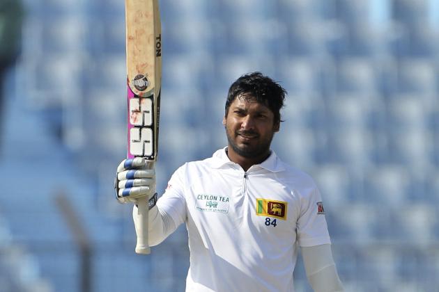 Sri Lanka’s Kumar Sangakkara acknowledges the crowd after scoring a century on the first day of the second test cricket match against Bangladesh in Chittagong, Bangladesh, Tuesday, Feb. 4, 2014. Sangakkara's 34th century steered Sri Lanka to a commanding 314-5 against Bangladesh at stumps Tuesday.(AP Photo)