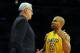 LOS ANGELES, CA - DECEMBER 01: Derek Fisher #2 of the Los Angeles Lakers speaks to Head Coach Phil Jackson during the game against the New Orleans Hornets at Staples Center on December 1, 2009 in Los Angeles, California. (Photo by Harry How/Getty Images) NOTE TO USER: User expressly acknowledges and agrees that, by downloading and/or using this Photograph, user is consenting to the terms and conditions of the Getty Images License Agreement.