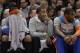New York Knicks' Carmelo Anthony, left, J.R. Smith, center, and Amar'e Stoudemire, right, watch their team play during the first half of an NBA basketball game against the Philadelphia 76ers Monday, March 10, 2014, in New York. (AP Photo/Frank Franklin II)