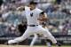 New York Yankees' Masahiro Tanaka, of Japan, delivers a pitch during the first inning of a baseball game against the Minnesota Twins Saturday, May 31, 2014, in New York. (AP Photo/Frank Franklin II)