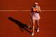 PARIS, FRANCE - JUNE 05: Maria Sharapova of Russia celebrates victory during her women's singles semi-final match against Eugenie Bouchard of Canada on day twelve of the French Open at Roland Garros on June 5, 2014 in Paris, France. (Photo by Clive Brunskill/Getty Images)