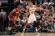 SAN ANTONIO, TX - JUNE 05: Tim Duncan #21 of the San Antonio Spurs handles the basketball against Chris Bosh #1 of the Miami Heat during Game One of the 2014 NBA Finals between the Miami Heat and San Antonio Spurs at AT&T Center on June 5, 2014 in San Antonio, Texas. NOTE TO USER: User expressly acknowledges and agrees that, by downloading and/or using this photograph, user is consenting to the terms and conditions of the Getty Images License Agreement. Mandatory Copyright Notice: Copyright 2014 NBAE (Photo by Andrew D Bernstein/NBAE via Getty Images)