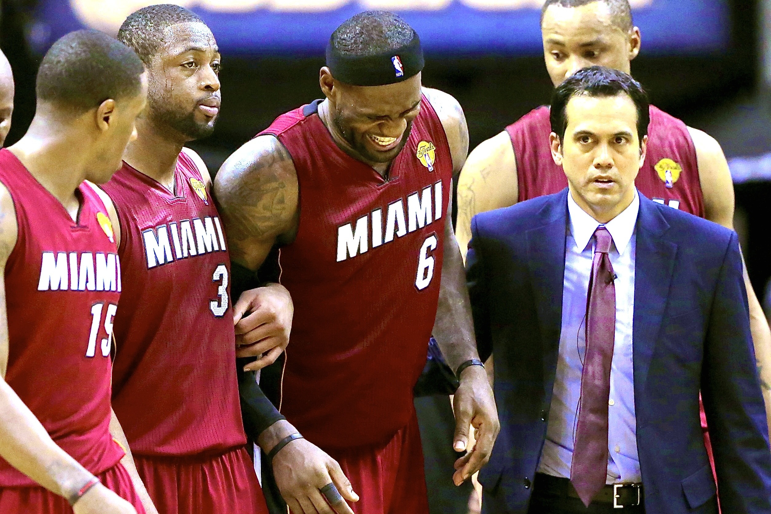 Heat's LeBron James (cramps) forced out during crunch time of Finals Game 1  - Sports Illustrated
