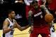 SAN ANTONIO, TX - JUNE 05: LeBron James #6 of the Miami Heat makes a pass against the San Antonio Spurs during Game One of the 2014 NBA Finals at the AT&T Center on June 5, 2014 in San Antonio, Texas. NOTE TO USER: User expressly acknowledges and agrees that, by downloading and or using this photograph, User is consenting to the terms and conditions of the Getty Images License Agreement. (Photo by Chris Covatta/Getty Images)
