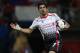 Liverpool's Luis Suarez celebrates after scoring his side's third goal a goal during the English Premier League soccer match between Crystal Palace and Liverpool at Selhurst Park stadium in London, Monday, May 5, 2014. (AP Photo/Alastair Grant)