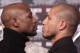 Boxers Floyd Mayweather, left, and Miguel Cotto face-off during a news conference in New York, Tuesday, Feb. 28, 2012. Cotto and Mayweather will fight in Las Vegas on May 5, 2012 for Cotto's WBA World super welterweight title.. (AP Photo/Seth Wenig)