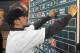 Shortstop Michael Chavis from Sprayberry Senior High School in Marietta, Georgia, posts his name on the board at the 2014 MLB baseball draft Thursday, June 5, 2014, in Secaucus, N.J. Chavis was selected by the Boston Red Sox with the 26th pick in the first round. (AP Photo/Bill Kostroun)