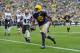 GREEN BAY, WI - OCTOBER 20: Jermichael Finley #88 of the Green Bay Packers scores on a 10-yard touchdown reception during the first quarter against the Cleveland Browns at Lambeau Field on October 20, 2013 in Green Bay, Wisconsin. (Photo by Brian Kersey/Getty Images)