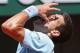 Serbia's Novak Djokovic screams before smashing his racket during the semifinal match of the French Open tennis tournament against Serbia's Novak Djokovic at the Roland Garros stadium, in Paris, France, Friday, June 6, 2014. (AP Photo/Michel Euler)