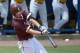 College of Charleston’s Blake Butler hits a double in the regional clincher against Long Beach State on Monday.