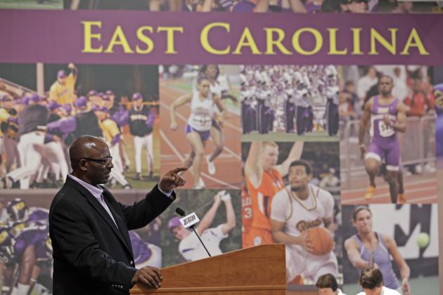 East Carolina coach Ruffin McNeill speaks to reporters during football media day in Greenville, N.C., Saturday, Aug. 6, 2011. (AP Photo/Gerry Broome)